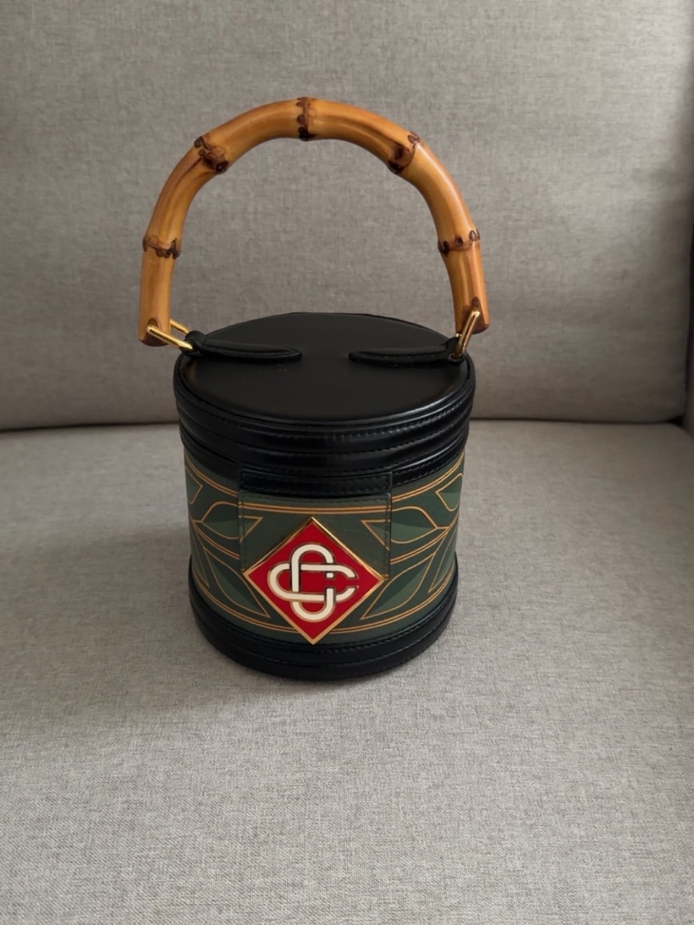 Black Cylinder Bamboo Handle Handbag with Green & Red Accent